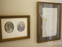 Family photos and documents framed for unique accents